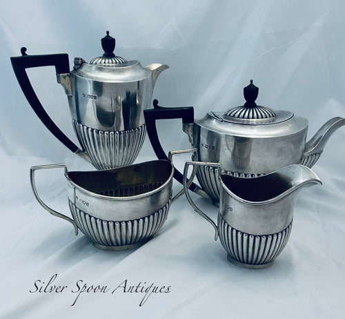 Four Piece English Sterling Silver Tea & Coffee Set, Charles Boyton & Son Ltd, London, 1913