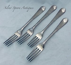 Set of four beaded pattern Georgian silver tableforks, George Smith, London, 1780