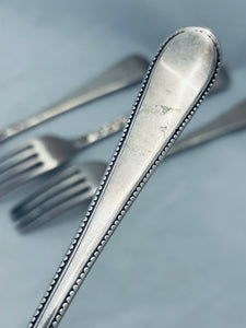 Set of four beaded pattern Georgian silver tableforks, George Smith, London, 1780